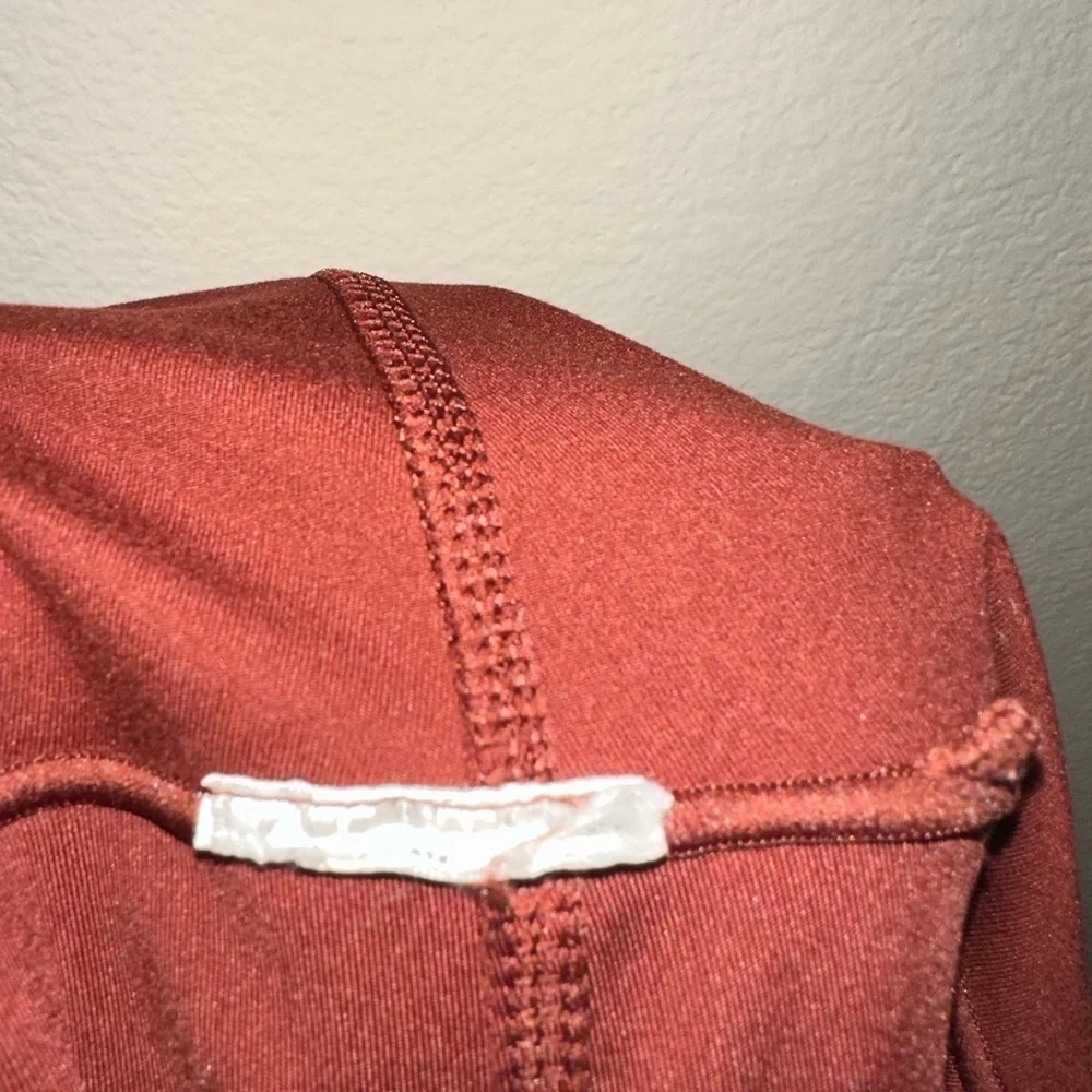 Uniqlo women’s burnt orange athletic leggings M activewear athleisure pockets